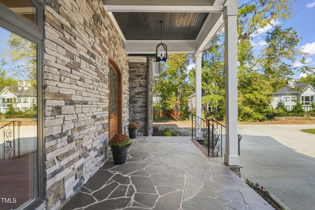 view of patio featuring a porch