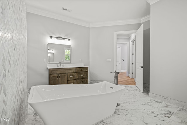 bathroom featuring vanity, tile walls, ornamental molding, and a bath