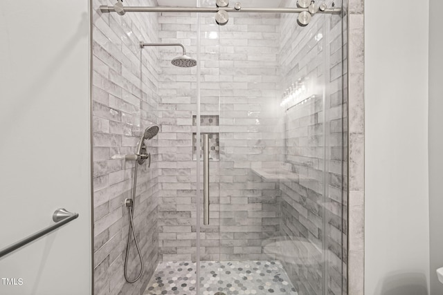 bathroom featuring walk in shower