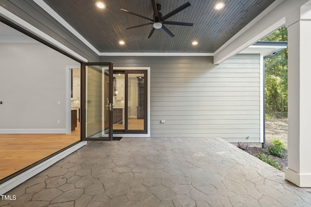 view of patio / terrace featuring ceiling fan