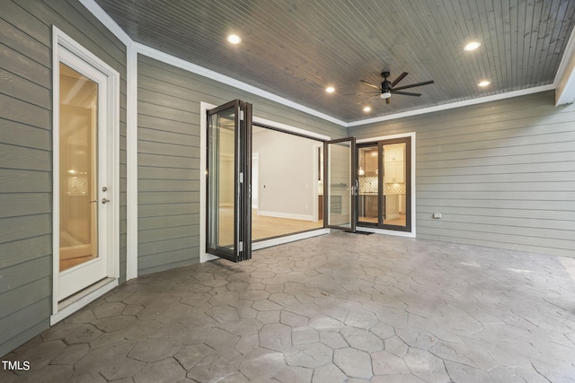 view of patio / terrace with ceiling fan