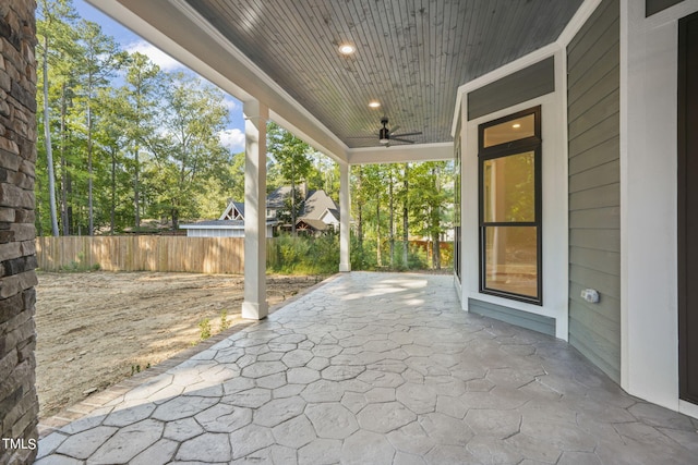 view of patio featuring ceiling fan