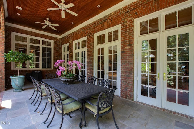 view of patio / terrace featuring ceiling fan and french doors