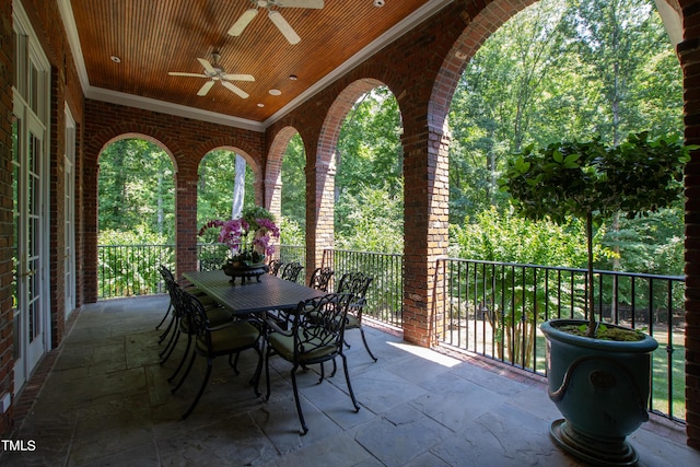 view of patio featuring ceiling fan