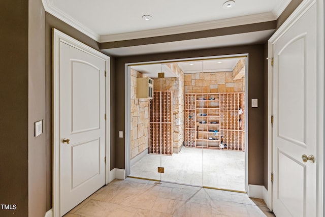 wine room with ornamental molding