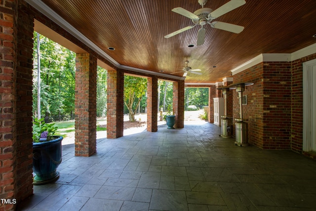 view of patio / terrace featuring an outdoor kitchen and ceiling fan