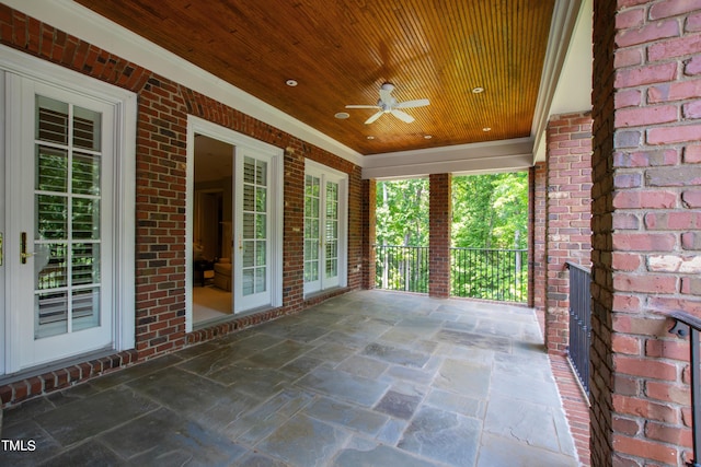 view of patio / terrace with ceiling fan and a porch