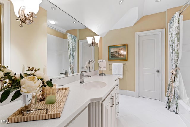 bathroom with shower / bath combo, vanity, vaulted ceiling, and tile patterned floors