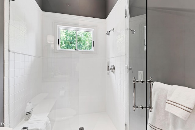 bathroom featuring an enclosed shower