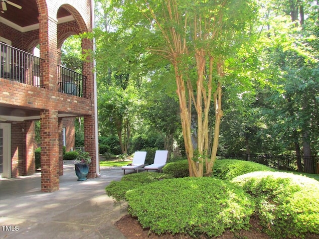 1820 Oatlands Ct, Wake Forest, NC 27587 - view of yard featuring a patio area and a balcony