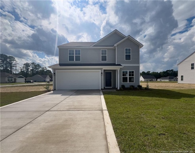 front of property with a front yard and a garage