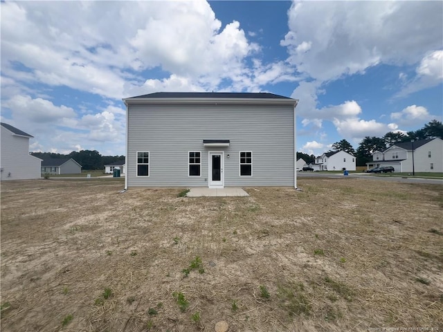 rear view of property with a patio area