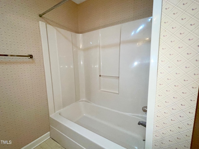 bathroom with shower / tub combination