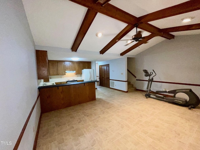 kitchen with white refrigerator, lofted ceiling with beams, ceiling fan, and kitchen peninsula