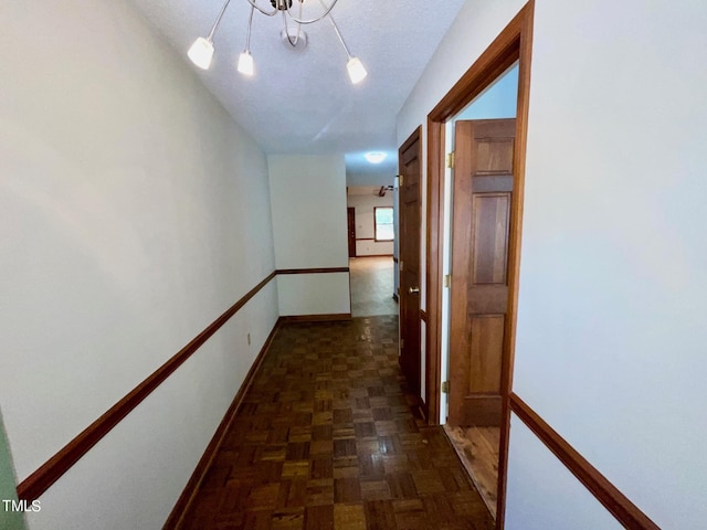 corridor with dark parquet floors