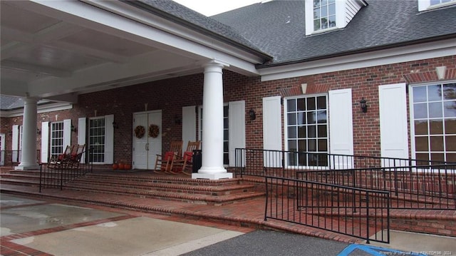 property entrance with covered porch