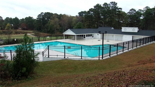 view of swimming pool featuring a patio area