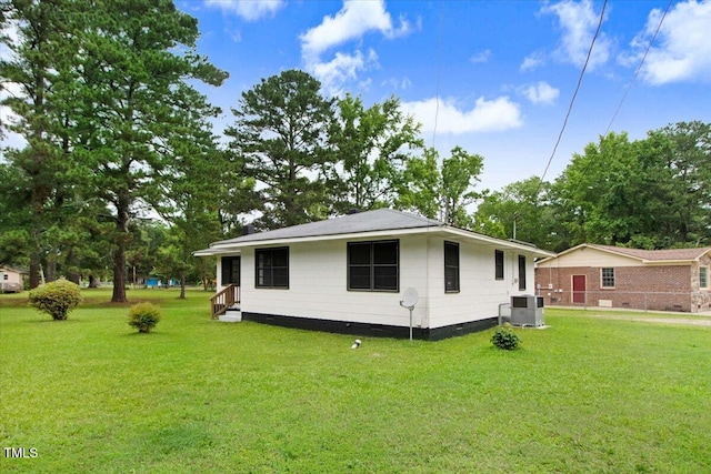 325 Bell St, Enfield, NC 27823 - view of home's exterior with crawl space and a lawn