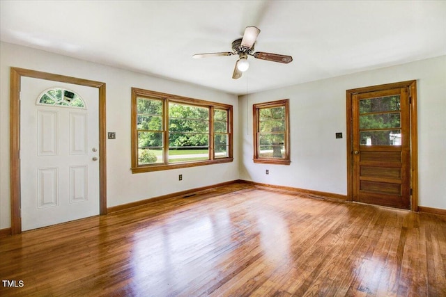 325 Bell St, Enfield, NC 27823 - entrance foyer with wood finished floors and a ceiling fan