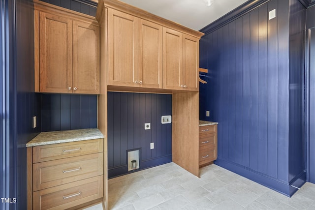 unfurnished office with wooden walls