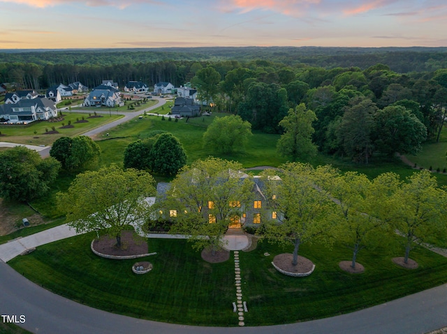 aerial view featuring a view of trees