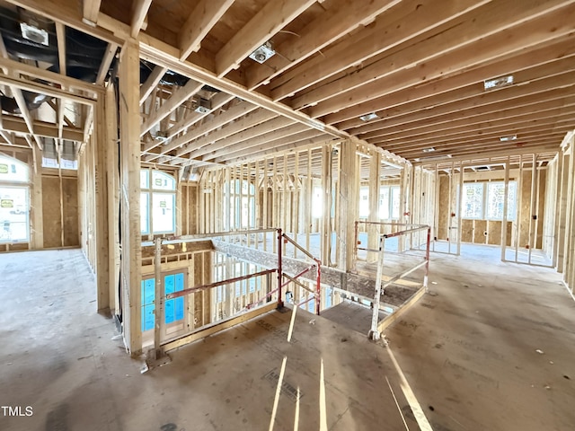 miscellaneous room with plenty of natural light and an upstairs landing