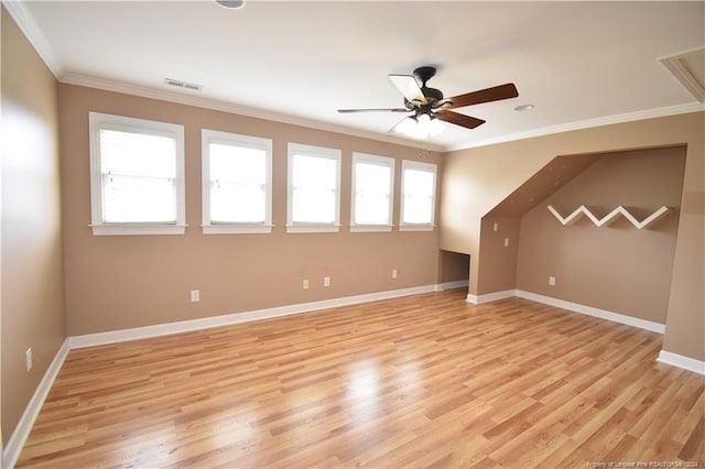 additional living space with ceiling fan and light hardwood / wood-style floors