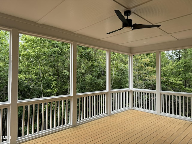 wooden deck with ceiling fan