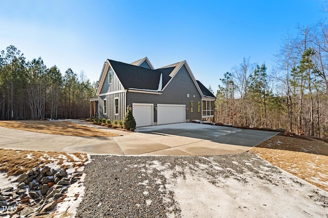 view of side of property featuring a garage