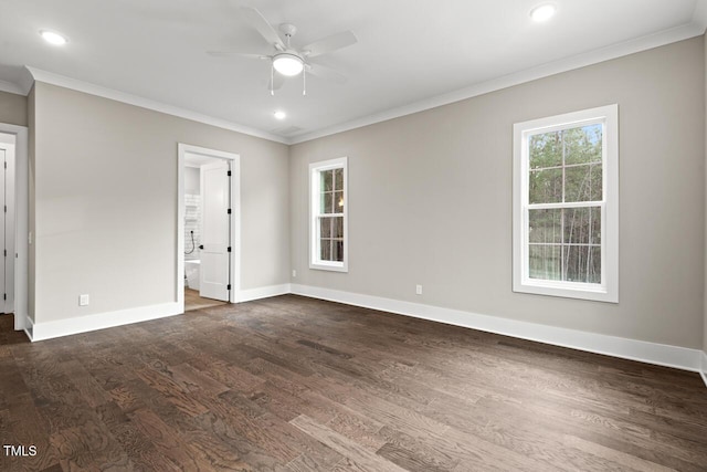 unfurnished room featuring crown molding and dark hardwood / wood-style flooring