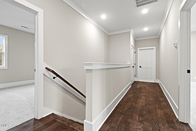 hall featuring dark hardwood / wood-style flooring and ornamental molding