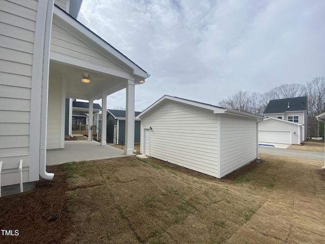 view of property exterior featuring an outdoor structure