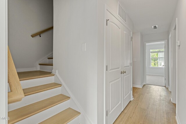 9249 Kitchin Farms Way Unit 432, Wake Forest, NC 27587 - stairs featuring hardwood / wood-style flooring and baseboards