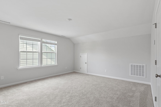 9249 Kitchin Farms Way Unit 432, Wake Forest, NC 27587 - unfurnished room featuring carpet floors, vaulted ceiling, and baseboards