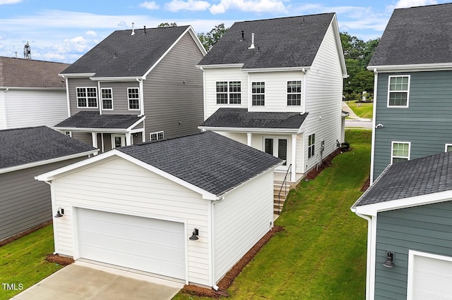 9249 Kitchin Farms Way Unit 432, Wake Forest, NC 27587 - back of house with concrete driveway, an attached garage, a yard, and a shingled roof