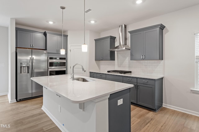 9249 Kitchin Farms Way Unit 432, Wake Forest, NC 27587 - kitchen featuring wall chimney range hood, appliances with stainless steel finishes, a sink, gray cabinetry, and recessed lighting