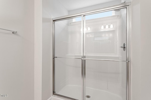 bathroom with a stall shower