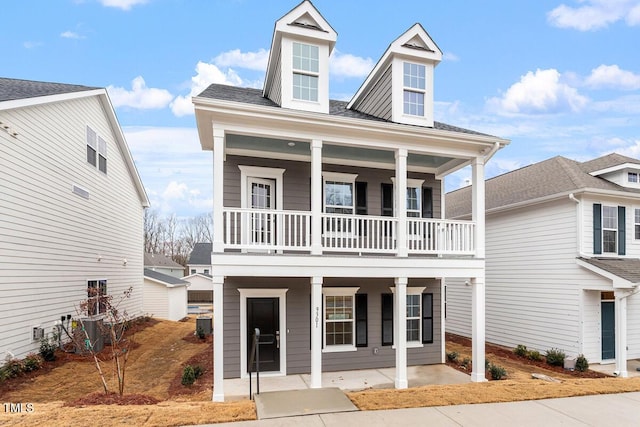 view of front facade featuring cooling unit and covered porch