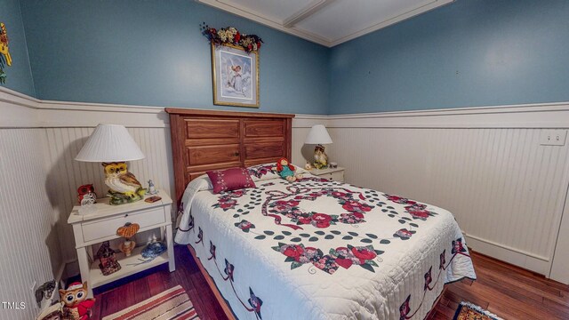 bedroom featuring dark hardwood / wood-style flooring