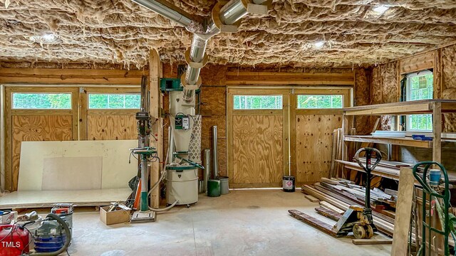 miscellaneous room with concrete floors and plenty of natural light