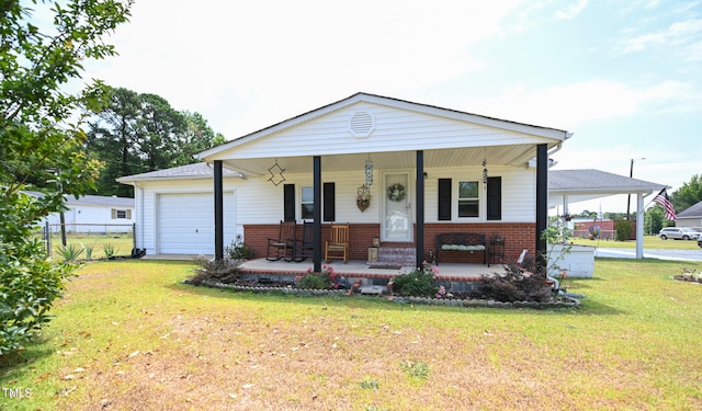 view of front of house featuring a garage, a front lawn, and a porch