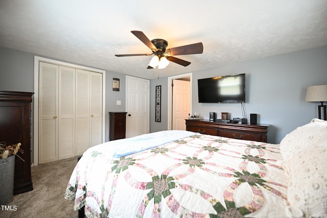 bedroom with ceiling fan, light carpet, and a textured ceiling