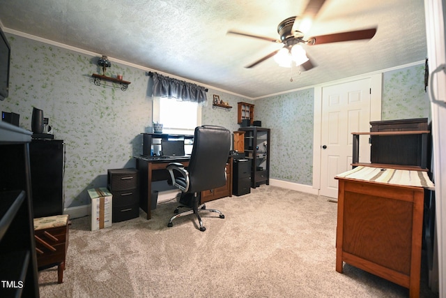 office area with crown molding, carpet floors, ceiling fan, and a textured ceiling