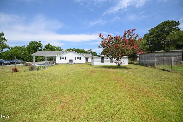 view of yard featuring a carport