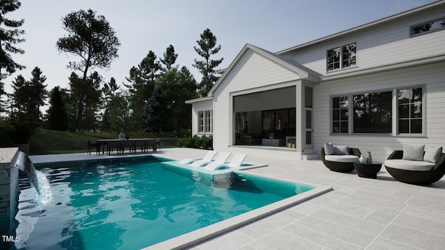 outdoor pool with a patio area