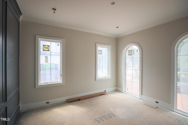 865 Wimbleton Dr, Raleigh, NC 27609 - spare room featuring crown molding and baseboards