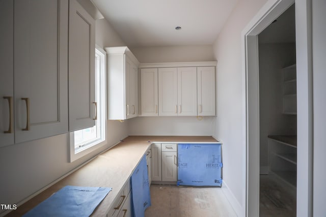 865 Wimbleton Dr, Raleigh, NC 27609 - kitchen with light countertops and white cabinets