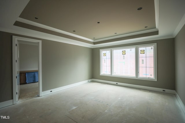 865 Wimbleton Dr, Raleigh, NC 27609 - empty room with a raised ceiling and ornamental molding