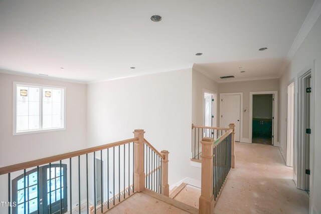 865 Wimbleton Dr, Raleigh, NC 27609 - hallway featuring an upstairs landing and crown molding