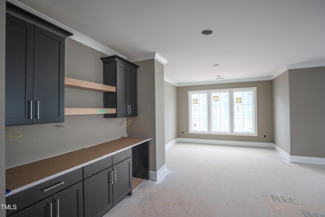 865 Wimbleton Dr, Raleigh, NC 27609 - kitchen with baseboards, open shelves, crown molding, and recessed lighting